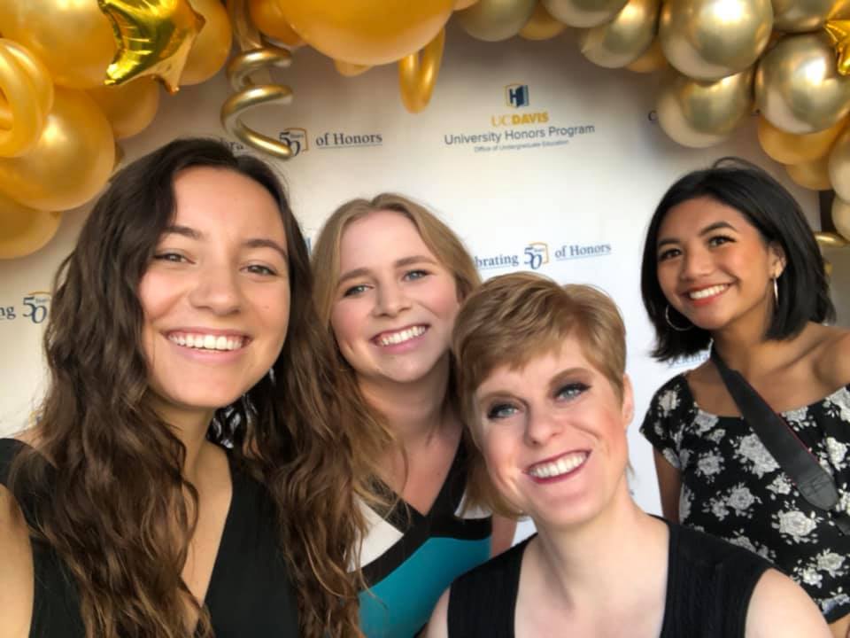 Student staff taking a selfie at the UHP 50th luncheon